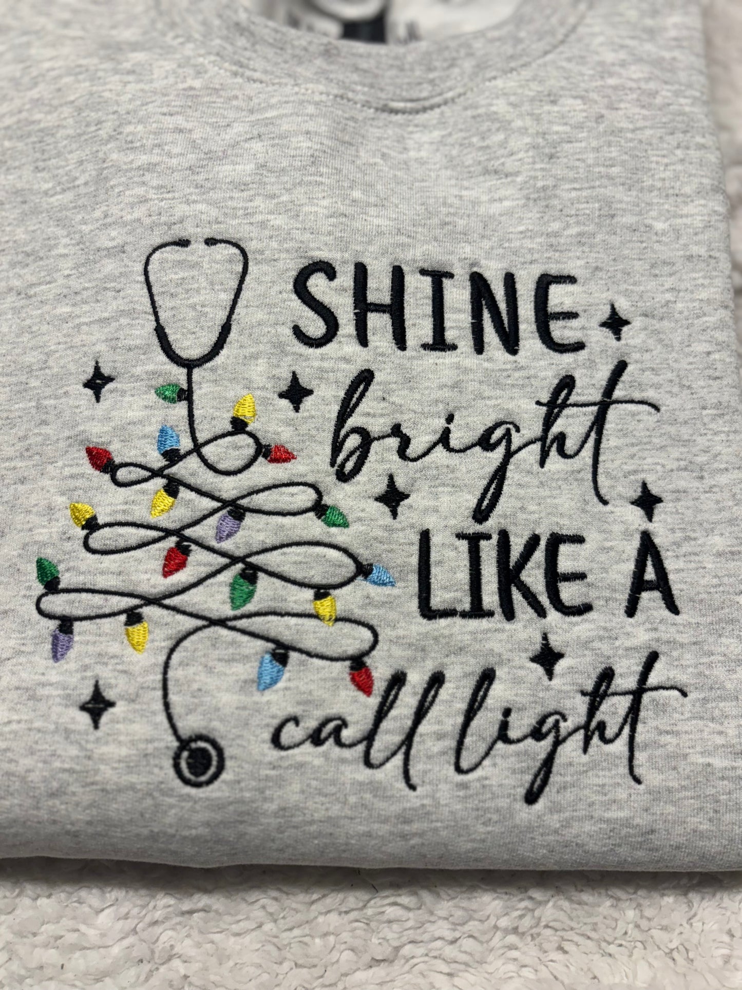 Shine Bright Like A Call Light Crewneck