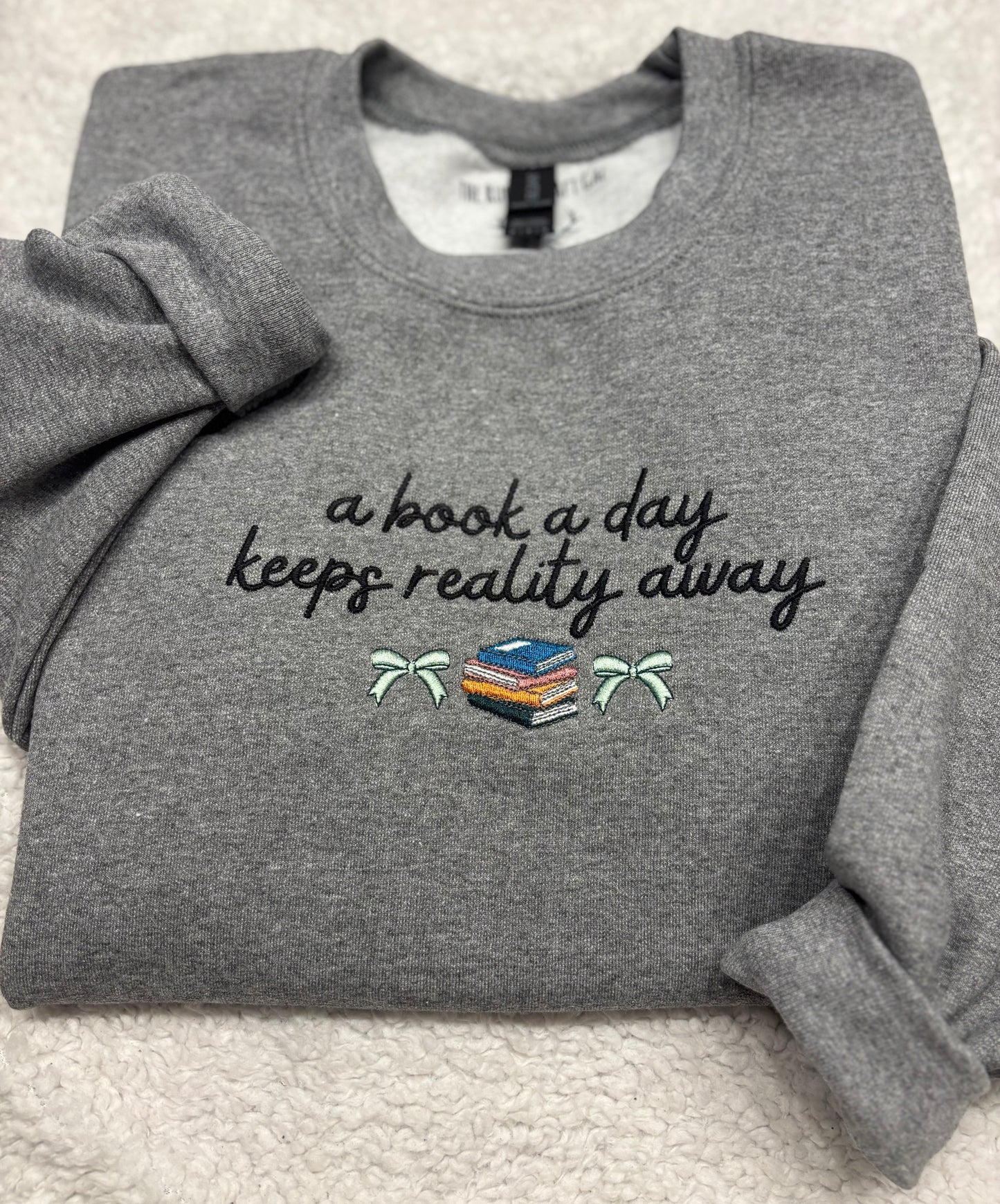 A Book A Day Keeps Reality Away Crewneck